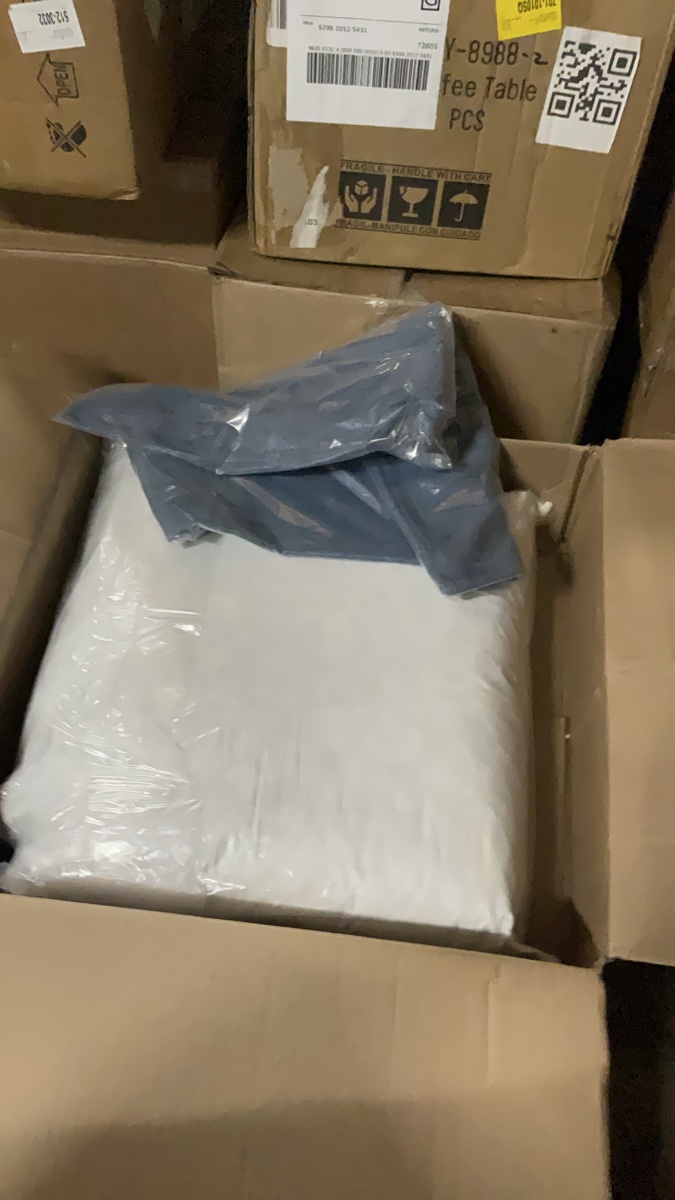 Textile items in protective plastic packaging