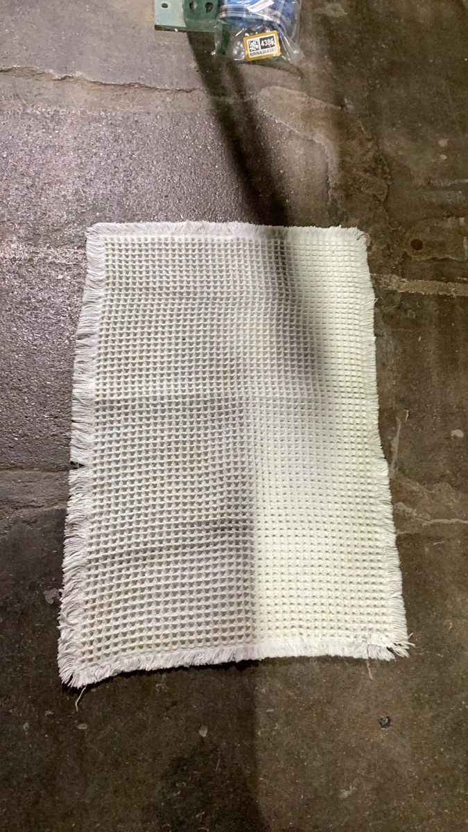 (Smells, needs cleaned )White Cotton Waffle Weave Bath Mat with Fringed Edges