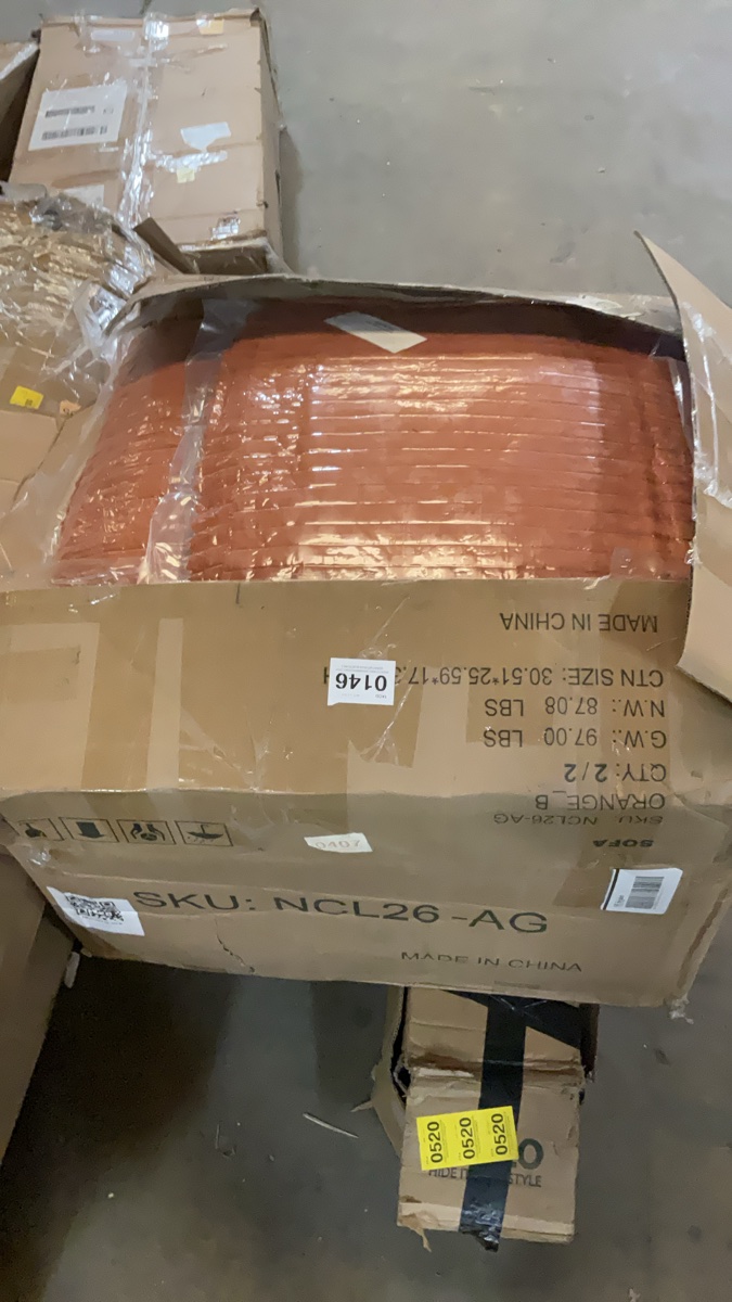 Orange cushions and couch pieces