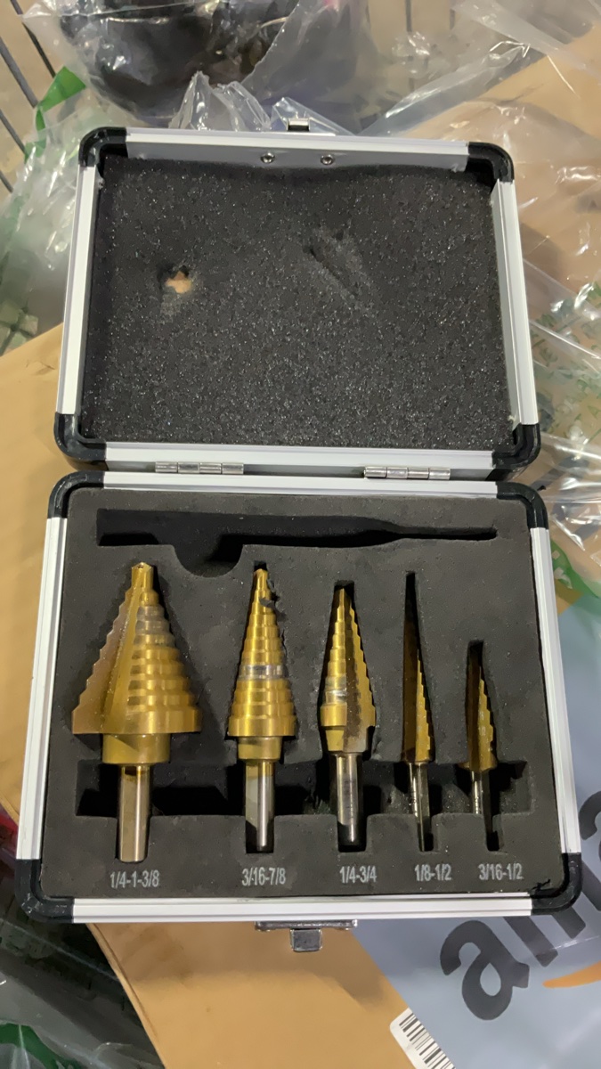 (Incomplete see photo)6-Piece HSS Titanium Coated Step Drill Bit Set with Aluminum Carrying Case