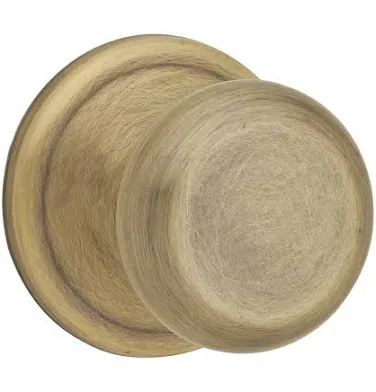 Kwikset Signature Series Juno Hall & Closet Door Knob, Antique Brass