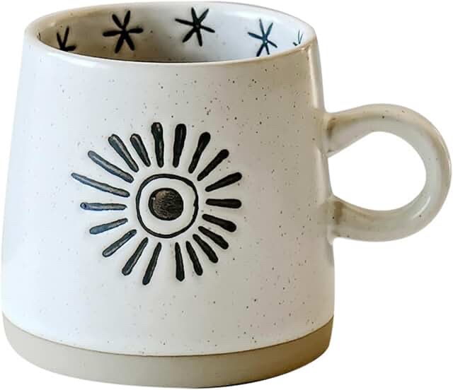 Ceramic Coffee Mug with Sunburst Design and Star Interior Pattern