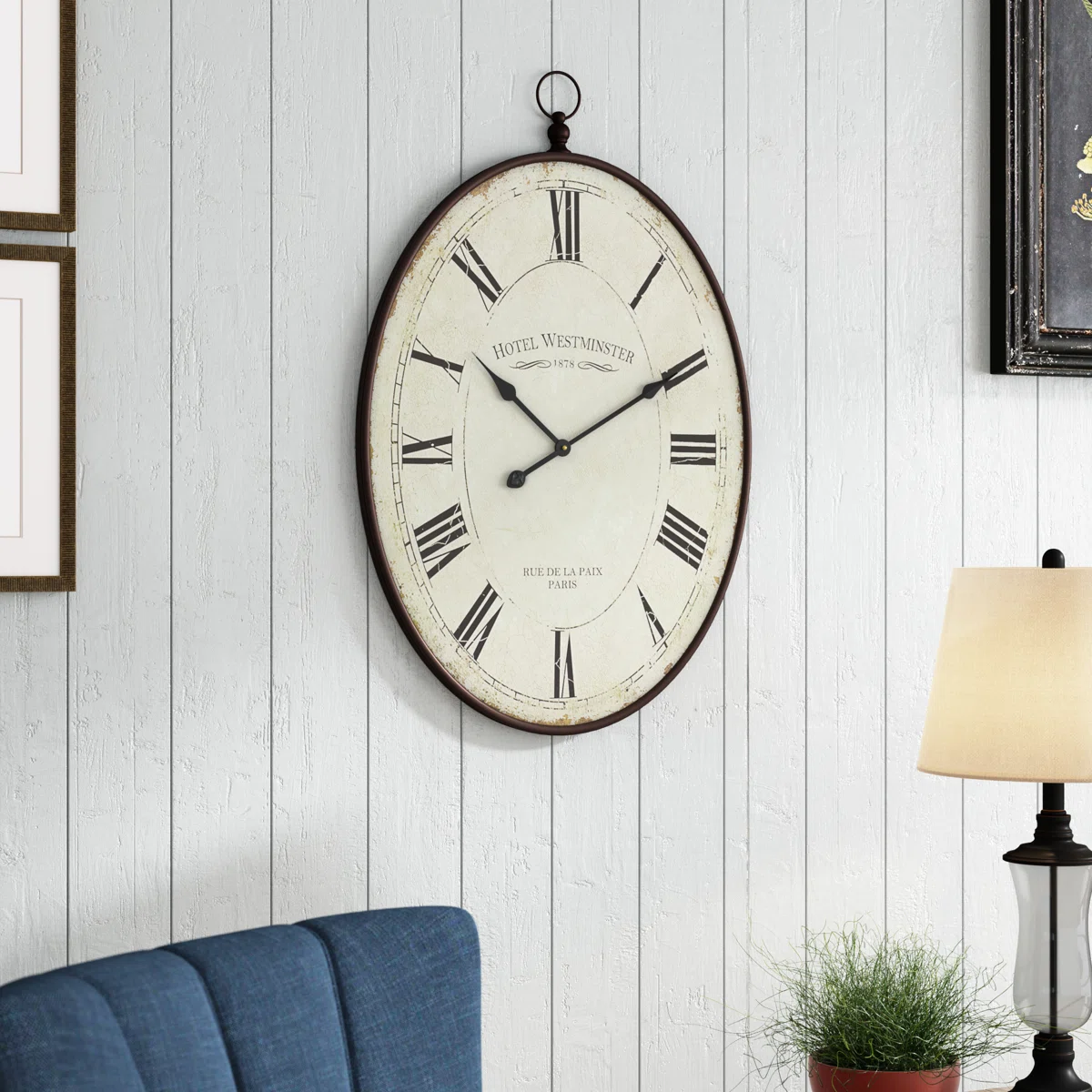 Immanuel 36'' H Oval Metal Wall Clock