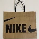 Brown Nike shopping bag